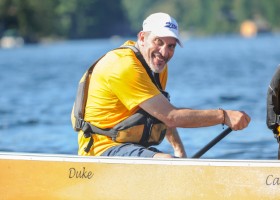 Duke in a canoe